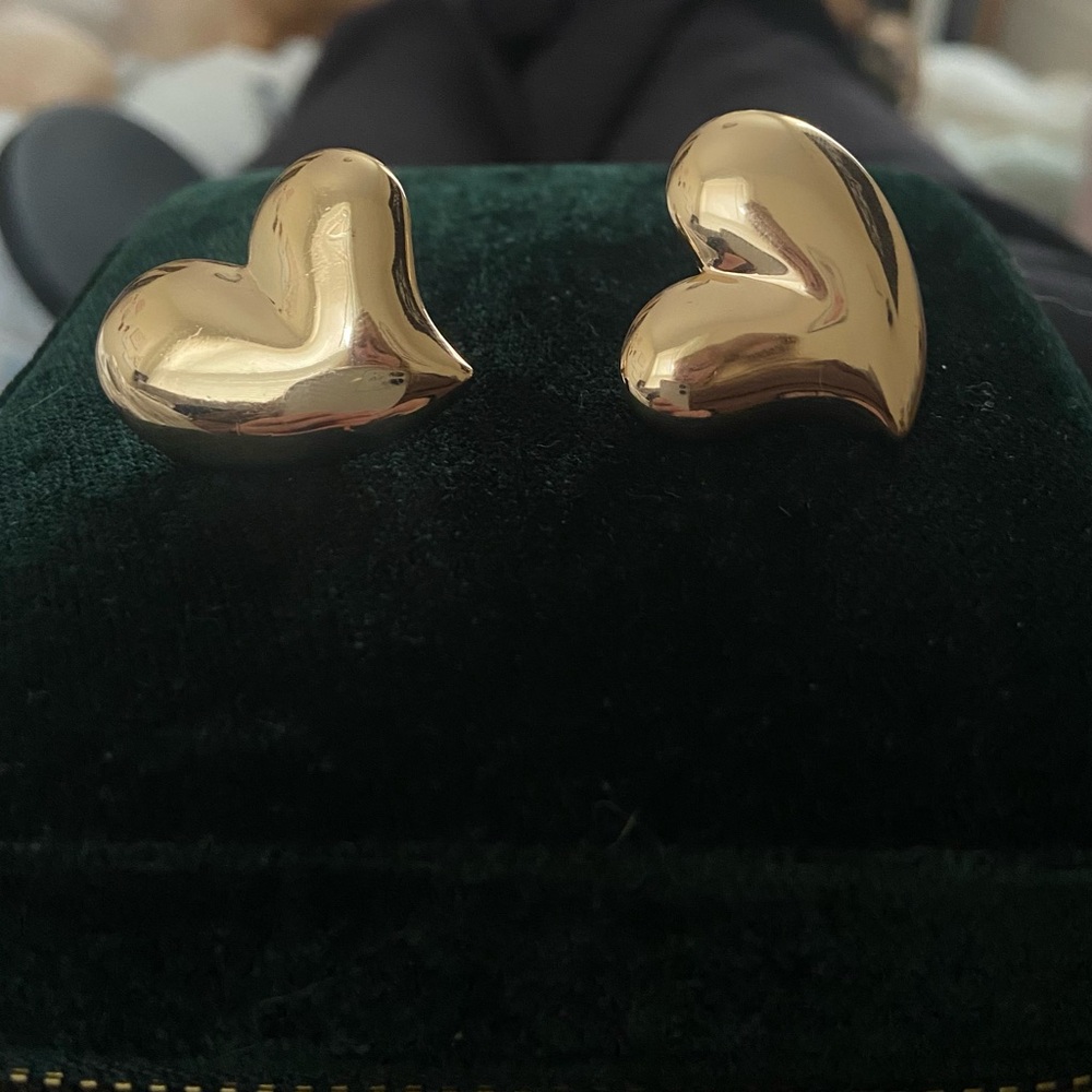 Camila Coelho gold heart earrings
